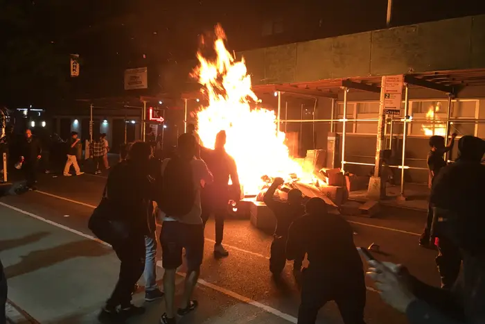 A construction dumpster caught fire at University Place and 12th Street in Manhattan during protests on May 31st.